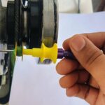 Sewing machine bobbin winder tool